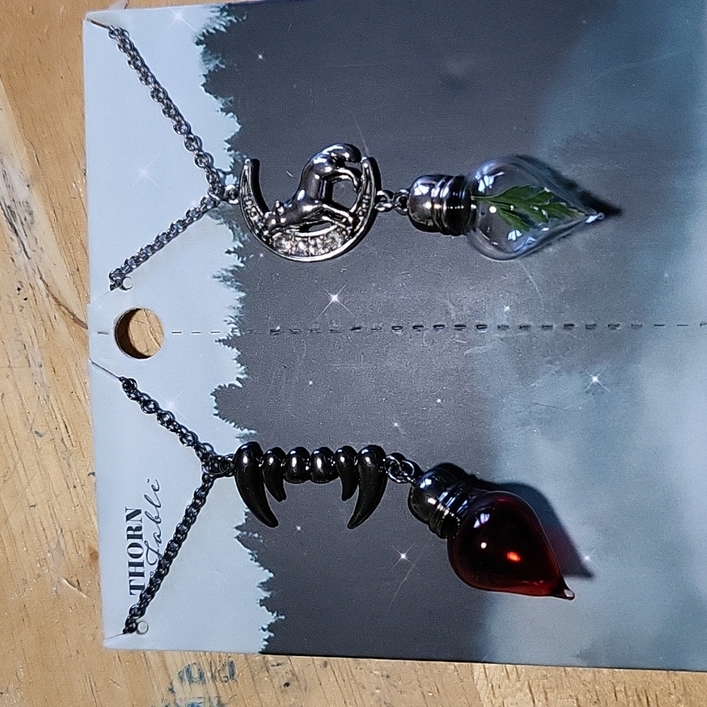Hot Topic vampire/werewolf BFF necklaces